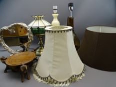 THREE DECORATIVE TABLE LAMPS, a silvered standing mirror and a carved wooden bowl on elephant feet