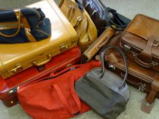 LINCOLN DELUXE OF NEW YORK SUITCASE with further luggage items and a leather document case