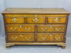OAK LANCASHIRE MULE CHEST, the lift-up top crossbanded in mahogany, having interior storage space