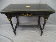 AESTHETIC STYLE EBONIZED & INLAID MAHOGANY CARD TABLE, the castors stamped 'C & C Patent', 74cms