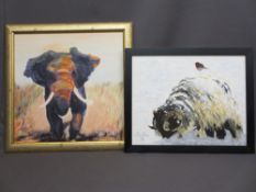 JOHN ROSS oils on canvas - a charging elephant, 49 x 49cms and a snow covered ram, 39 x 50cms