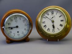 TWO VINTAGE CLOCKS including a circular oak Tempora brand with chromed bezel and a brass cased