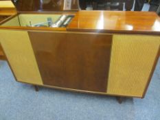 BUSH MID CENTURY RADIOGRAM with Monarch turntable and built-in speakers, 77.5cms H, 124.5cms W, 40.