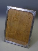 BRIGHT CUT SILVER PICTURE FRAME with shaped corners, Birmingham 1926, 19.5 x 14cms picture size