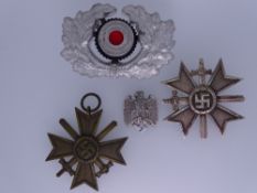 WORLD WAR II GERMAN THIRD REICH WAR MERIT CROSSES, First and Second Class, wreath and cockade