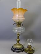 VICTORIAN OIL LAMP with clear glass font and duplex wick turners and decorative glass shade with a