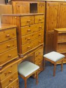 MODERN PINE BEDROOM SUITE comprising twin two door wardrobes, 183cms H, 90cms W, 63cms D, a pedestal