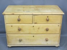 VINTAGE STRIPPED PINE CHEST of two short over two long drawers with turned wooden knobs, 75.5cms