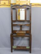 A POLISHED HALL STAND with central bevelled mirror, drip trays, 201cms H, 85cms W, 33cms D