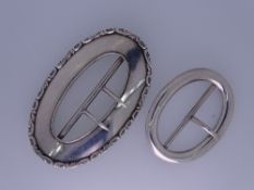 TWO EDWARDIAN SILVER BELT BUCKLES, Birmingham 1909, maker William Comyns & Son and Birmingham