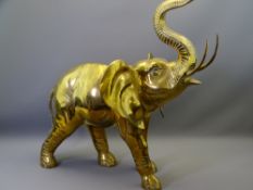 LARGE BRASS ELEPHANT ORNAMENT, 68cms H, 67cms L