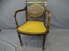 REGENCY MAHOGANY BERGERE ARMCHAIR with oval panel and carved detail to the back, 83cms H, 58cms W,