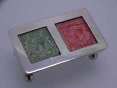 SILVER STAMP BOX, plain drum shaped on four ball supports by Blancksee & Sons, complete with eight