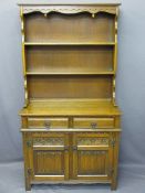 REPRODUCTION OAK NEATLY PROPORTIONED DRESSER with linen fold and other carved detail, 176cms H, 52.