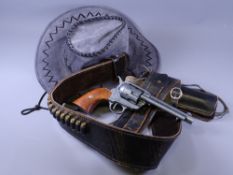 SPANISH REPLICA REVOLVER with leather holster and belt along with a wide brimmed hat