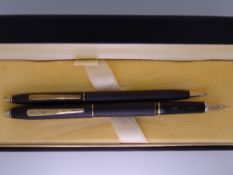 CROSS - Modern Matte Black Cross Classic Century fountain and ballpoint pens with gold trim and