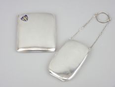 TWO CIGARETTE CASES including a curved pocket shape example with enamelled shield inset,