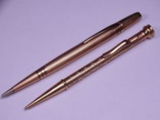 TWO 9CT GOLD STAMPED VINTAGE RETRACTABLE PENCILS, one marked 'Life Long' with banding and engine