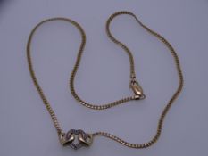 A 9CT GOLD TRIPLE HEART PENDANT with dart link chain, 7.3grms