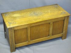 REPRODUCTION OAK BLANKET CHEST with carved detail to the top, 45cms H, 94cms W, 40.5cms D
