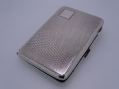 A LADY'S CIGARETTE CASE, engine turned, by John Rose, Birmingham 1927, 2.5ozs