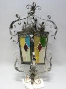 VINTAGE STYLE WROUGHT IRON & COLOURED GLASS HALL LANTERN, 66cms H