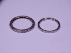 TWO PLATINUM & POSSIBLY WHITE GOLD RINGS to include an unmarked diamond set full eternity ring, size