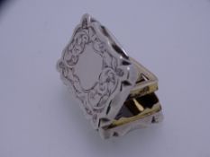 SILVER VINAIGRETTE with shaped and scrolled sides, bright cut scroll decoration and gilt interior