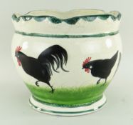 RARE LLANELLY POTTERY JARDINIERE painted with seven strutting black cocks on sponged grass, lobed