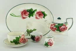 FIVE-PIECE LLANELLY POTTERY CABARET SET of tray, teapot, cup and saucer, cream-jug and sugar-