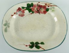 LLANELLY POTTERY MEAT PLATTER painted with briar roses with leaves, of rounded form, 41cms Condition