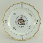 A RARE SWANSEA PEARLWARE PLATE BY HAYNES DILLWYN & CO of lobed form and having a feathered border,