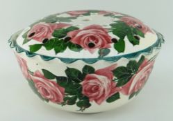 LLANELLY POTTERY ROSE BOWL painted with tea roses and foliage, circular footed with crimped rim, the