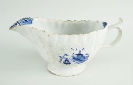 ISLEWORTH BLUE & WHITE SAUCEBOAT, circa 1768-75, of generous volume, fluted sides and front