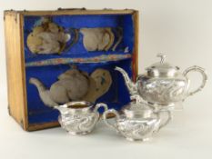 FINE BOXED CHINESE EXPORT SILVER THREE-PIECE TEASET BY WANG HING, c.1900 of bombe form, each