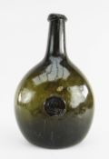 RARE 18TH CENTURY SEALED WINE BOTTLE, DATED 1777, of 'stretched' bladder form in olive green