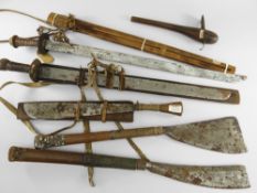 SIX ABOR WEAPONS, Assam, Northeast India, comprising three swords, two axes and an adze (6)