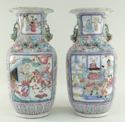 PAIR OF CHINESE CANTON FAMILLE ROSE PORCELAIN BALUSTER VASES, 19th Century, with everted petal