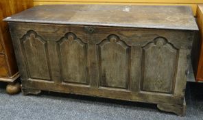 18TH CENTURY JOINED OAK COFFER with four arched panel front, 141cms wide Condition Report: top