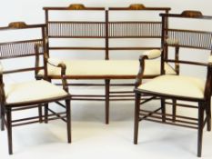 EDWARDIAN MARQUETRY INLAID MAHOGANY PART SALON SUITE comprising settee, two armchairs and five