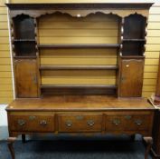 19TH CENTURY OAK SHROPSHIRE-TYPE HIGH DRESSER, dental cornice above ogee frieze and flute carved