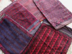 FIVE BALUCH TENT BAGS in various designs (5) Condition Report: all with insect damage to pile, to
