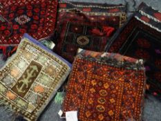 ASSORTED SMALL TRIBAL SADDLE BAGS including Baluch and other tribes (5) Condition Report: all with