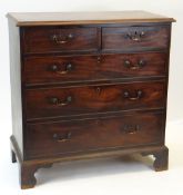 GEORGE III MAHOGANY CROSS BANDED CHEST, moulded top above five graduated drawers, bracket feet, 96 x