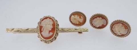 9CT GOLD CAMEO BROOCH TOGETHER WITH THREE matching yellow metal cameo earrings, 8gms overall (4)