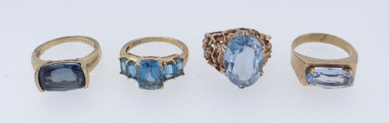 FOUR 9CT YELLOW GOLD RINGS SET WITH SEMI-PRECIOUS BLUE STONES, 15.5gms (4)