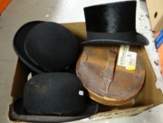 VINTAGE CHRISTY'S TOP HAT IN LEATHER HAT BOX, two other bowler hats and a riding hat (4) Provenance: