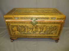 ORIENTAL CARVED CAMPHORWOOD CHEST raised on corner feet, 60cms H, 101cms W, 51cms D