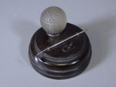 NOVELTY GOLFING DESK ORNAMENT, lighting glass ball with white metal club on a Bakelite base