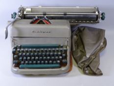REMINGTON VINTAGE TYPEWRITER WITH COVER and accessories